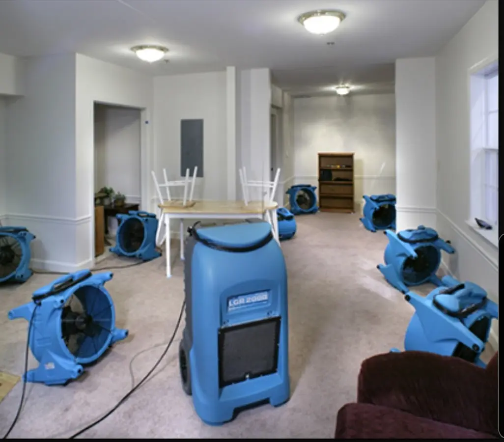 Air movers and dehumidifier setup for Water Damage Restoration in Pelham